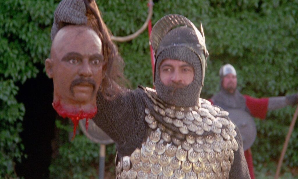 Nachy as Daninski, with the head of the Mongolian cheiftan in his 1983 film The Beast and the Magic Sword
