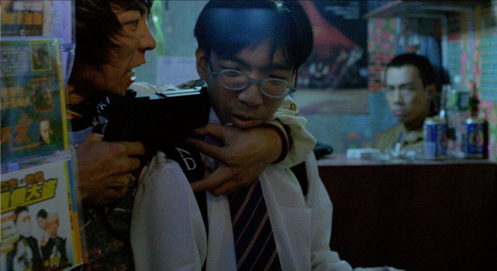Woody and Bee Bully a patron in Wilsion Yip's Bio Zombie (1998)