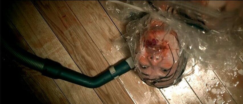 Still of the vacuum storage bag kill in Pang Ho-cheung's Dream Home